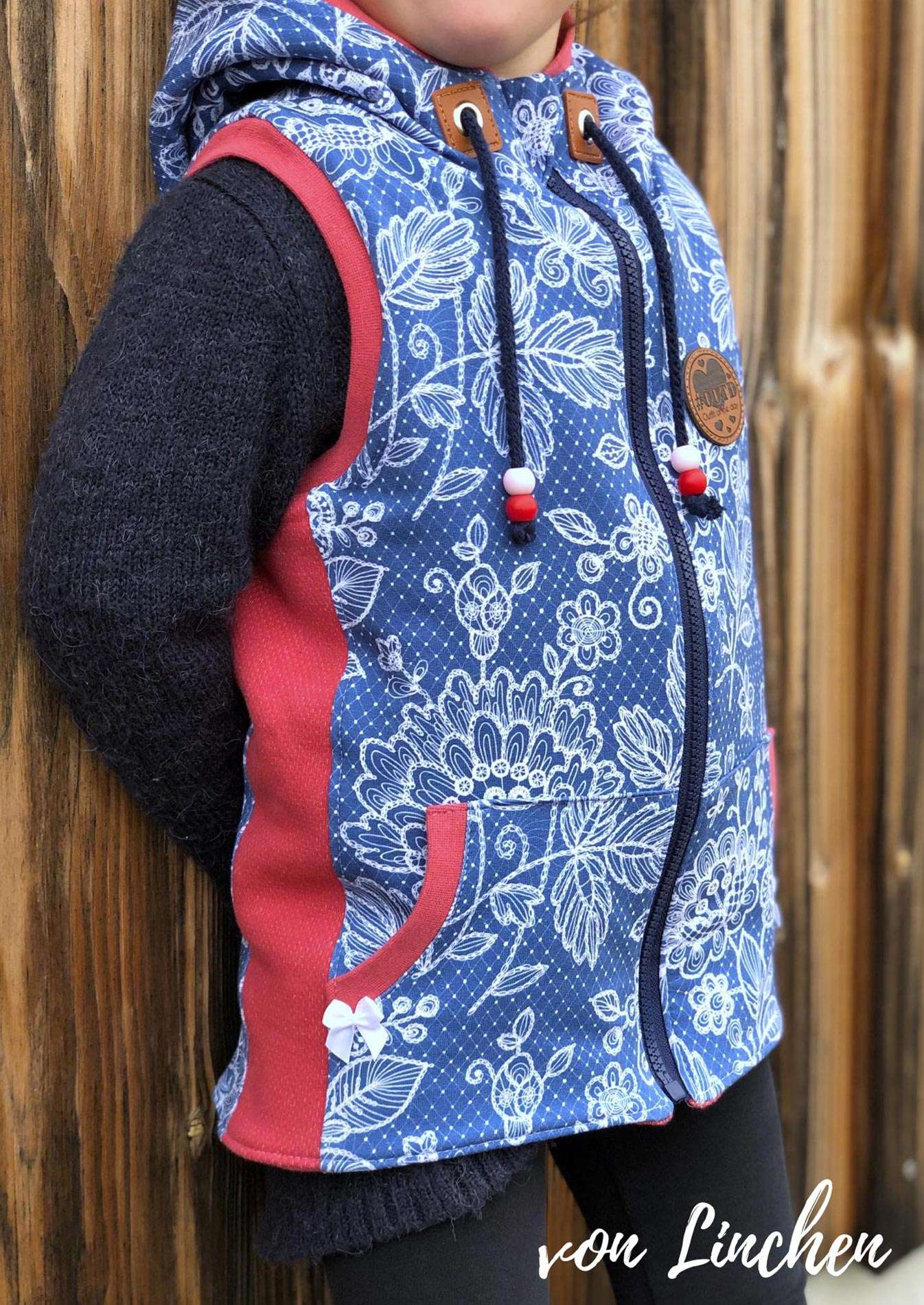 Snyggli-Schnittmuster-Weste-Livsglad-Baby-Kinder-Nähanleitung-Mädchen-Teilung